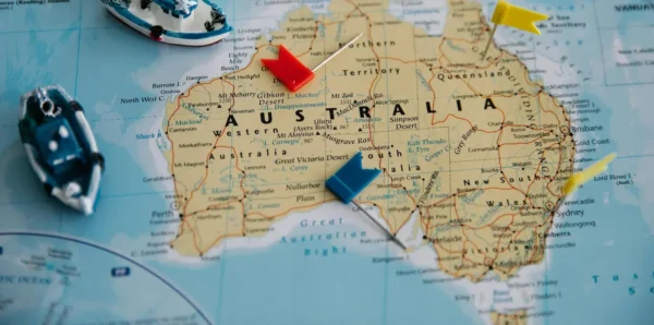 Toy Ships and Flags on Australia Map